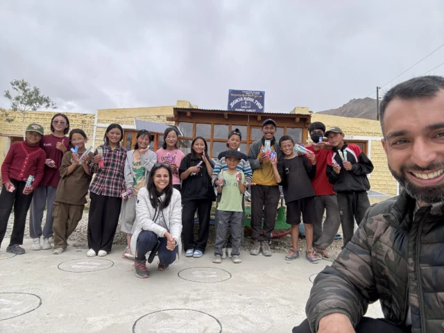 Dr. Prarthana and Ruchir Kalra promoting dental awareness in Ladakh 2025 with local villagers